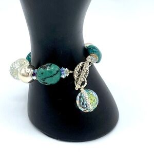 Turquoise colored stone and crystal bracelet